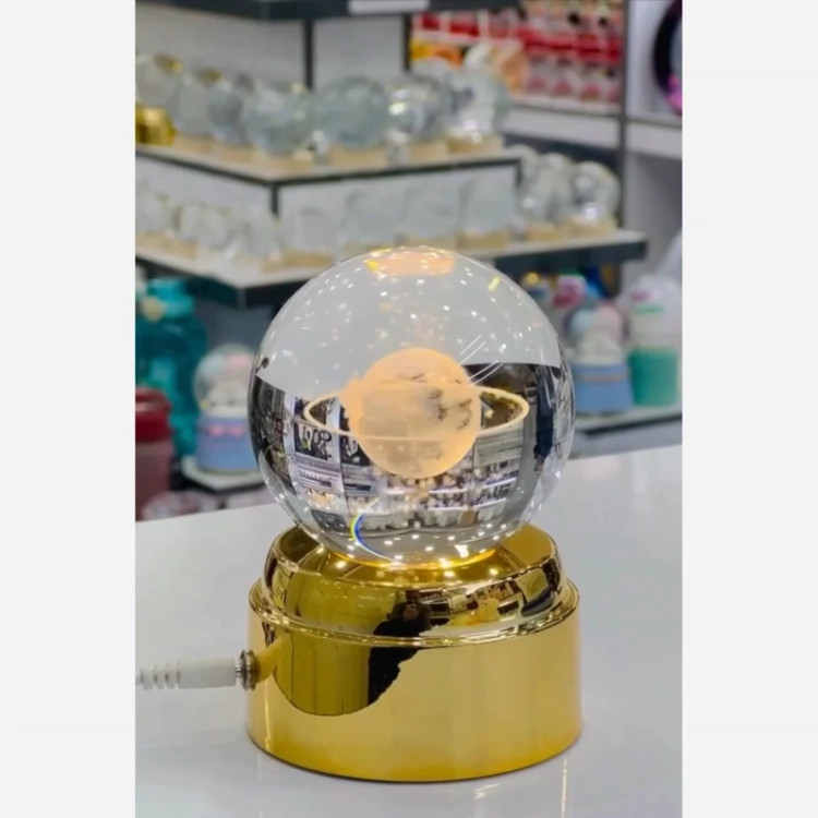 گوی کره شیشه ای زیبا با پایه طلایی و چرخشی مدل new kanada061