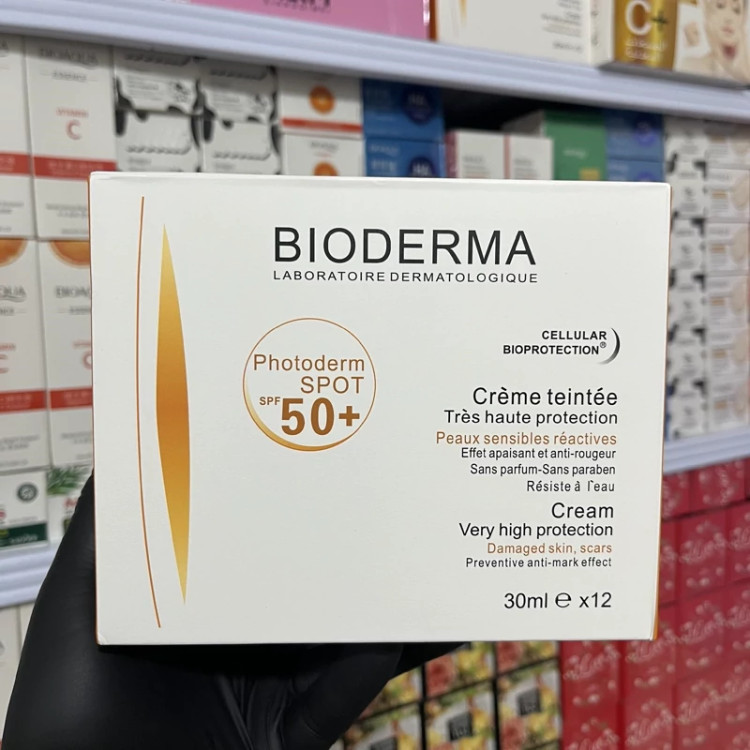 کرم ضدآفتاب بی رنگ بیودرما spf 50( کرم ضد آفتاب مخصوص پوست خشک و معمولی) مدل new kanada041