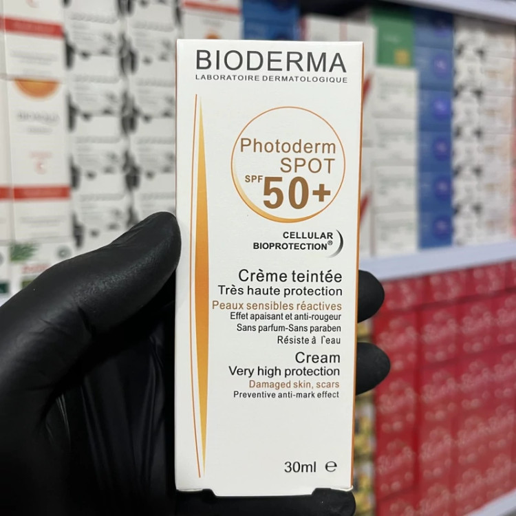 کرم ضدآفتاب بی رنگ بیودرما spf 50( کرم ضد آفتاب مخصوص پوست خشک و معمولی) مدل new kanada041