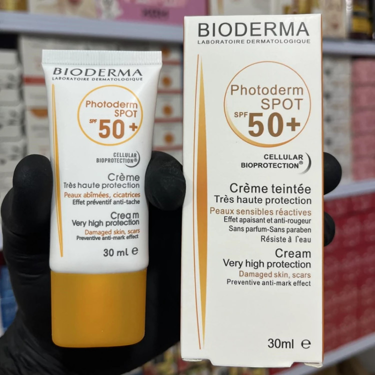 کرم ضدآفتاب بی رنگ بیودرما spf 50( کرم ضد آفتاب مخصوص پوست خشک و معمولی) مدل new kanada041