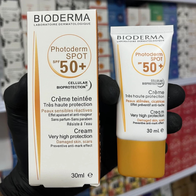 کرم ضدآفتاب بی رنگ بیودرما spf 50( کرم ضد آفتاب مخصوص پوست خشک و معمولی) مدل new kanada041
