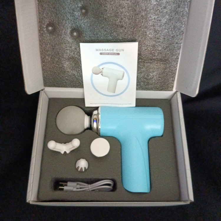 ماساژور تفنگی MINI MASSAGE GUN مدل MG-203 دارای 4 عدد سری ماساژ موجود در فروشگاه قشمی شاپ QESHMISHOP