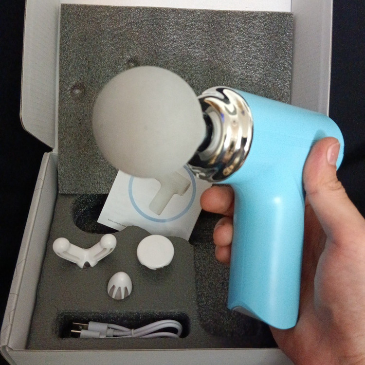 ماساژور تفنگی MINI MASSAGE GUN مدل MG-203 دارای 4 عدد سری ماساژ موجود در فروشگاه قشمی شاپ QESHMISHOP